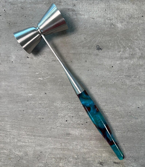 Alien Sunset Kitchen KnifeAcrylic shot jigger with 1/2, 3/4, 1 and 1 1/2 ounce shots. Yum!